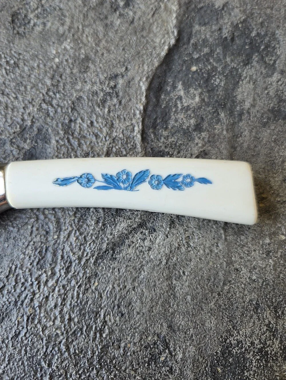 Cornflower Blue Lifetime Cutlery Serrated Table Knife with White Floral Handle